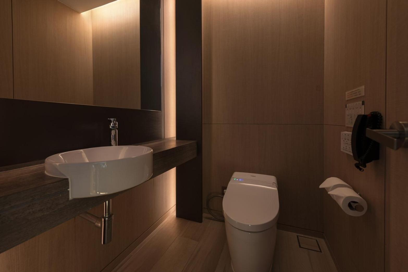 Mu Jiaoxi Hotel Exteriér fotografie A modern bathroom