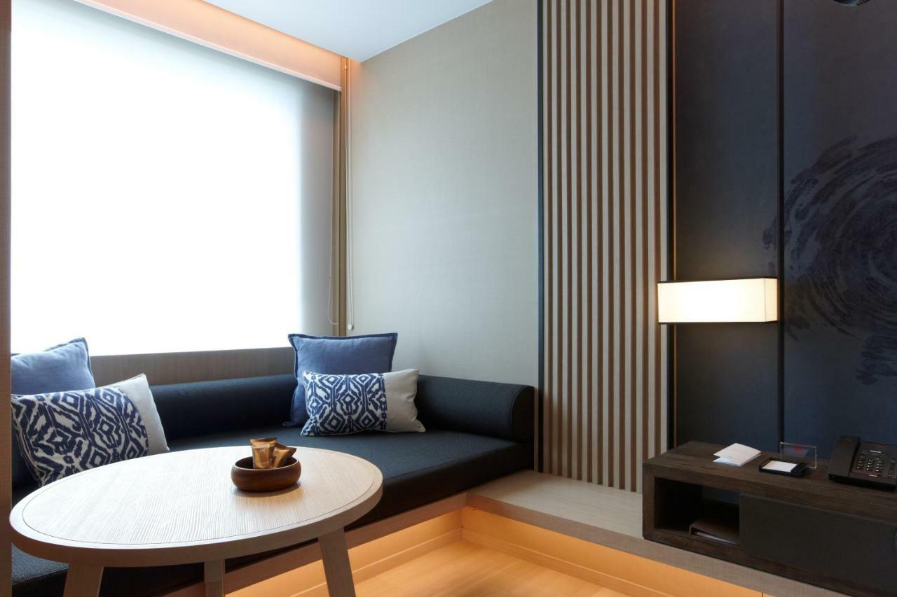 Mu Jiaoxi Hotel Exteriér fotografie A room at the hotel