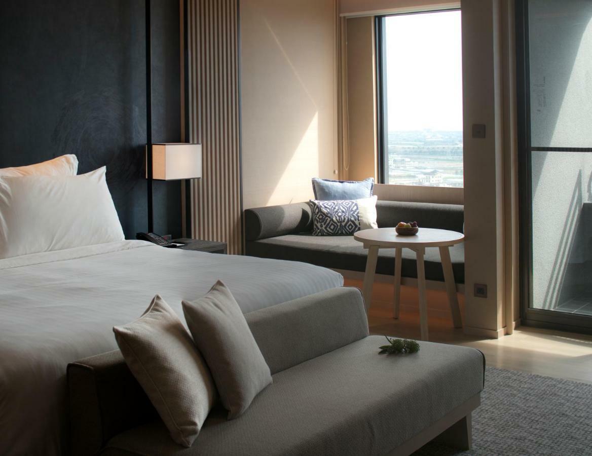 Mu Jiaoxi Hotel Exteriér fotografie A bedroom at the hotel